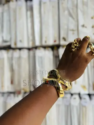 Photo - Wavy Gold Chunky Bangle Bracelet