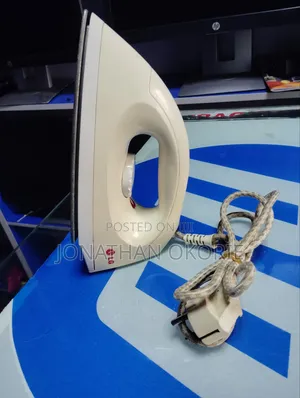 Photo - Fairly Used Dry Pressing Iron