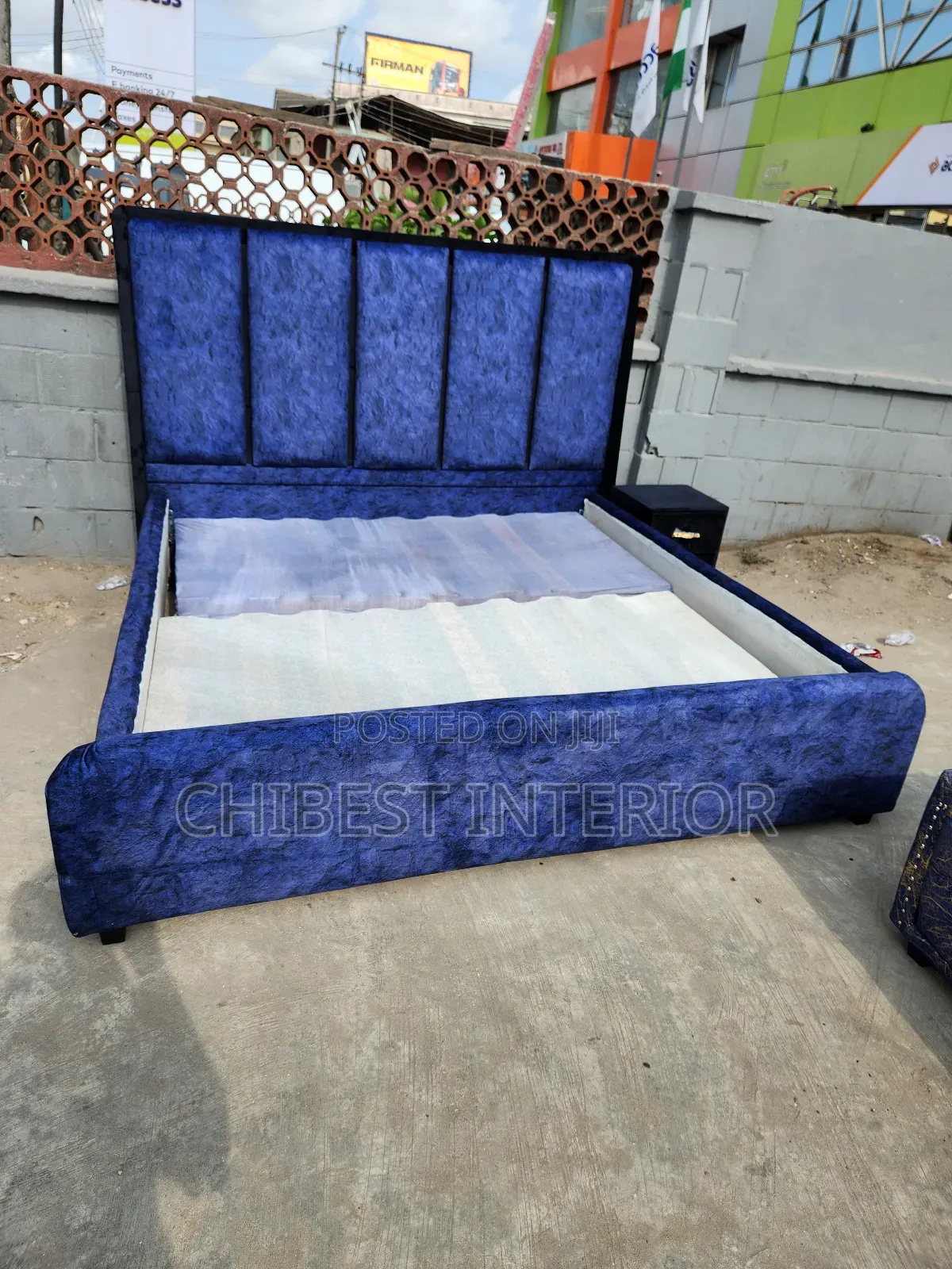 Padded 6by6 Blue Bed With a Black Side Drawer