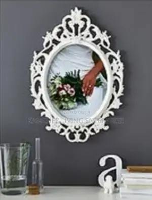 White Ornate Wall Mirror With Intricate Frame