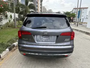 Honda Pilot Touring 4dr SUV 4WD (3.5L 6cyl 9A) 2016 Gray