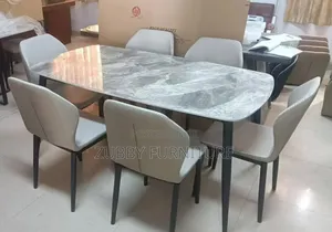 Quality and Imported Marble Top Dining Table by 6 Chairs
