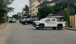 White Toyota Hilux 2023 for Security or Escort Rent.