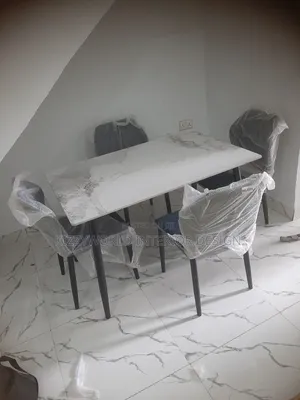 Dinning Table With Four Chairs.