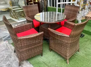 Rattan Dining Chairs and Table.