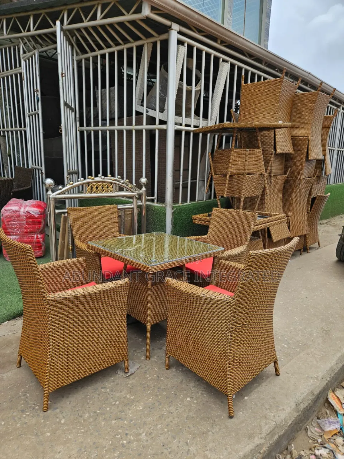 Wicker Patio Chairs With a Glass Table.