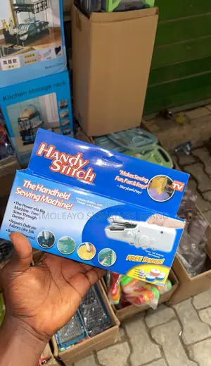 Photo - Handheld Mini Sewing Machine