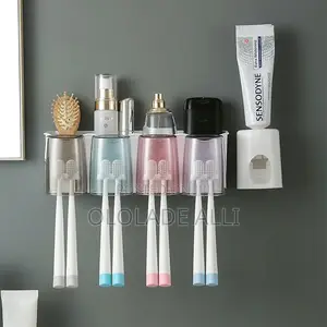 Toothpaste Dispenser With Toothbrush Holder