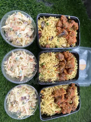 Photo - Fried Rice,Salad and Sauced Goat Meat