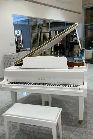 Self Playing White Grand Piano
