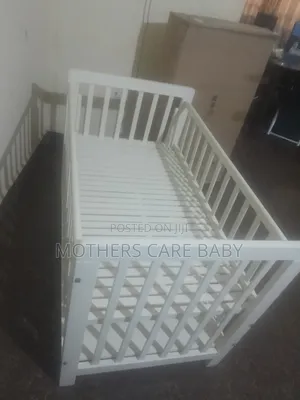 Photo - Wooden Cot