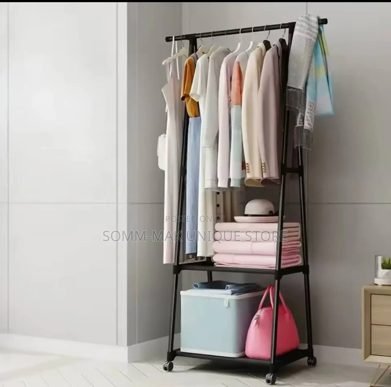 Removable Metal Coat Hanger With Wheel Storage Shelf