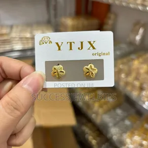 Photo - Stud Earrings. Gold Replica Quality Unisex Earrings in Lagos