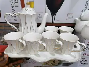 Set of Breakable Tea Cups, Tray and Jug