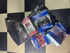Photo - Uk Used Playstation 3 With Two Pads and Games Installed I