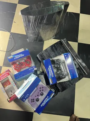 Photo - Ps3,Tv Guard, Two Controllers and All Accessories