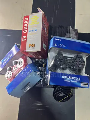 Photo - Fat Playstation 3 With Tv Guard and All Accessories