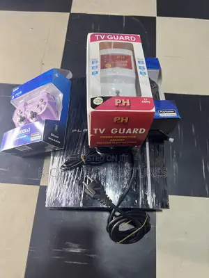 Photo - Fat Ps3 Console, 2 Pads,All Wires,Games Installed,Tv Guard