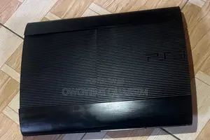 Photo - Ps 3 Slim Console With 2 Gamepad