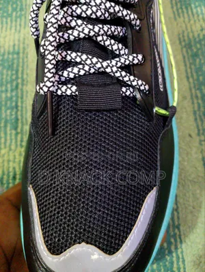 Black Running Snacker With a Touch of Green