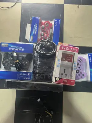 Photo - Playstation 3 With Tv Guard and All Accessories and Games