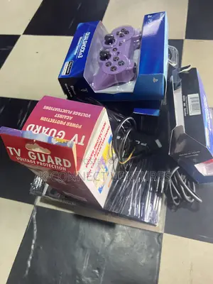 Photo - Uk Used Playstation 3 With Tv Guard, Two Pads, Games Inside