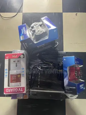 Photo - Uk Used Ps3 With Two Pads and Games Inside, All Accessories