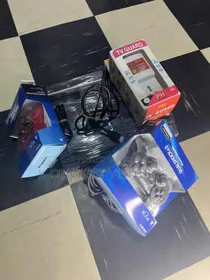 Photo - Playstation 3 Complete Set With Games and a Tv Guard