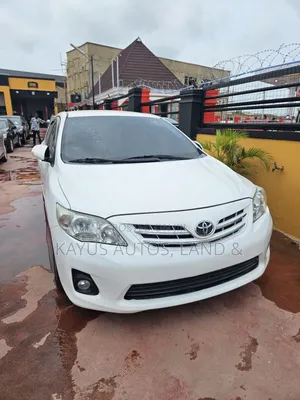 Photo - Toyota Corolla LE 4dr Sedan (1.8L 4cyl 4A) 2011 White