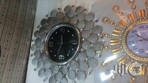 Unique Silver Wall Clock.
