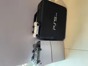 Photo - Playstation 5 for Sale–Excellent Condition. With Three Games