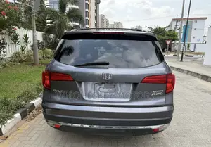 Honda Pilot Touring 4dr SUV 4WD (3.5L 6cyl 9A) 2016 Gray