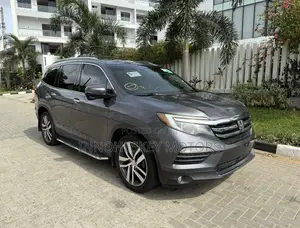 Honda Pilot Touring 4dr SUV 4WD (3.5L 6cyl 9A) 2016 Gray