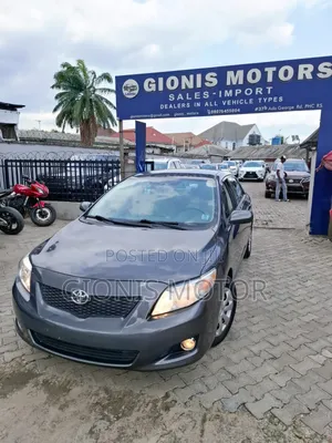 Toyota Corolla Base 4dr Sedan (1.8L 4cyl 5M) 2009 Gray