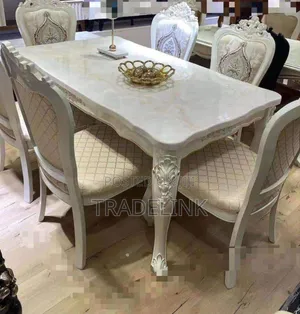 Table With Royal Leather Chairs