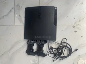 Photo - Ps3 With 7 Games Installed and Two Controller