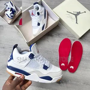 Photo - Original Nike Sb X Air Jordan 4 Retro “Summit White/Navy”