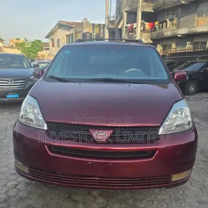 Photo - Toyota Sienna XLE Limited AWD (3.3L V6 5A) 2004 Red