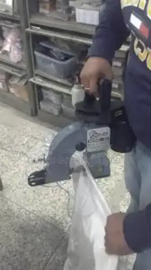 Industrial Stitching and Bag Closing Machine.