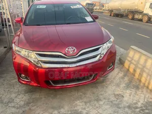 Photo - Toyota Venza LE 4dr Wagon AWD (3.5L 6cyl 6A) 2014 Red