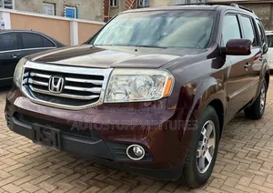 Honda Pilot Touring w/RES/Navi 4WD (3.5L 6cyl 5A) 2010 Burgundy