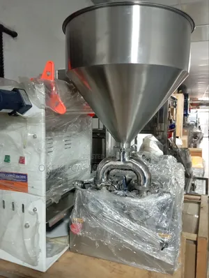 Double Nozzle Liquid Filling Machine