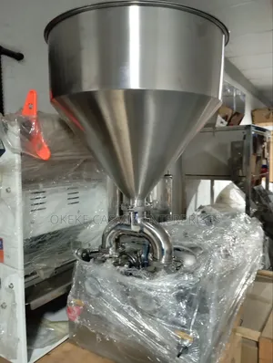 Double Nozzle Liquid Filling Machine