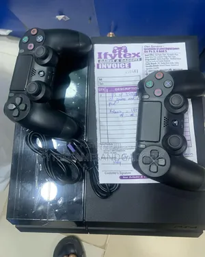 Neat as New Ps 4 Fat 500gb With 2 Pads and 12 Games