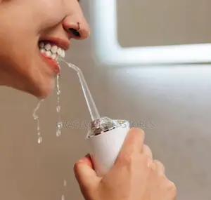 Photo - Oral Irrigator Portable Dental Water Flosser