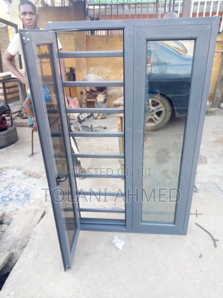 Grey Casement Window With Burglary