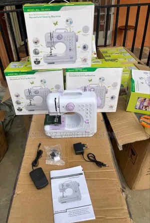 Photo - Mini Multifunctional Battery Electric Sewing Machine