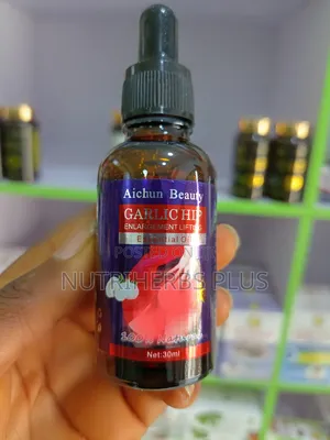 Photo - Aichun Beauty Garlic Essential Oil:Hip Butt Enlargement Oil