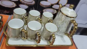 Photo - Porcelain Tea Pot Set and Tea Set