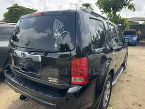 Honda Pilot Touring w/RES/Navi FWD (3.5L 6cyl 5A) 2010 Black